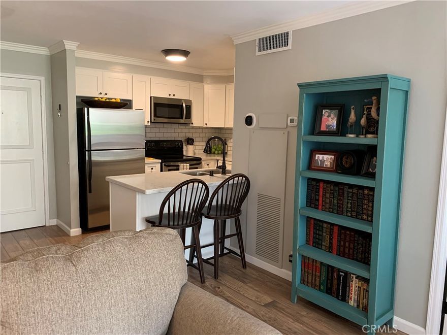 *Professional photos coming soon* Unlock the ultimate Southern California lifestyle in this oceanfront paradise at the renowned Queen's Surf building! You'll find yourself just steps from the sand, enjoying resort-style amenities that truly elevate coastal living. Step inside this beautifully updated, turnkey unit to find an upgraded kitchen boasting sleek cabinets, quartz countertops, and newer appliances. For superior comfort and convenience, the home includes central air conditioning and an in-unit washer/dryer, while the spacious bedroom provides a large walk-in closet with generous storage. The value extends through the HOA, which grants full access to an ocean-view pool, spa, sauna, gym, recreation room, community kitchen, and expansive decks. You'll enjoy stunning views of the shoreline and harbor right from the building, and the unit comes complete with assigned, secured garage parking and additional storage. The location is unbeatable, placing you centrally near all the best Long Beach has to offer, including waterfront shops, dining, cultural attractions like the Aquarium of the Pacific and The Queen Mary, and the local charm of Shoreline Village and Bixby Park. Don't miss the chance to own this highly-sought-after lifestyle!