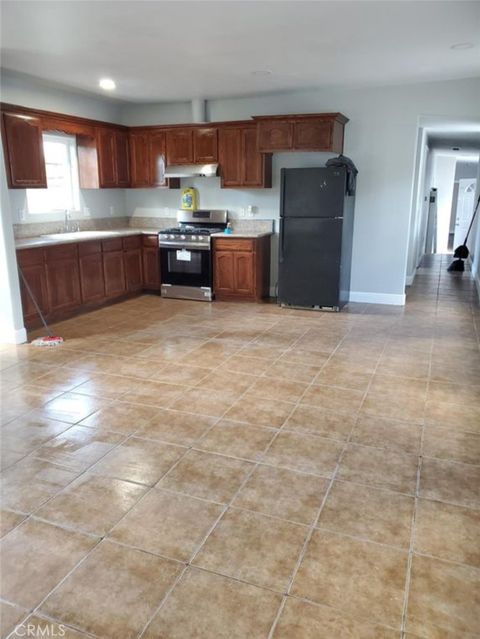 Photo of 1259 E 49th ST, Los Angeles, CA 90011 (MLS # DW26102885)