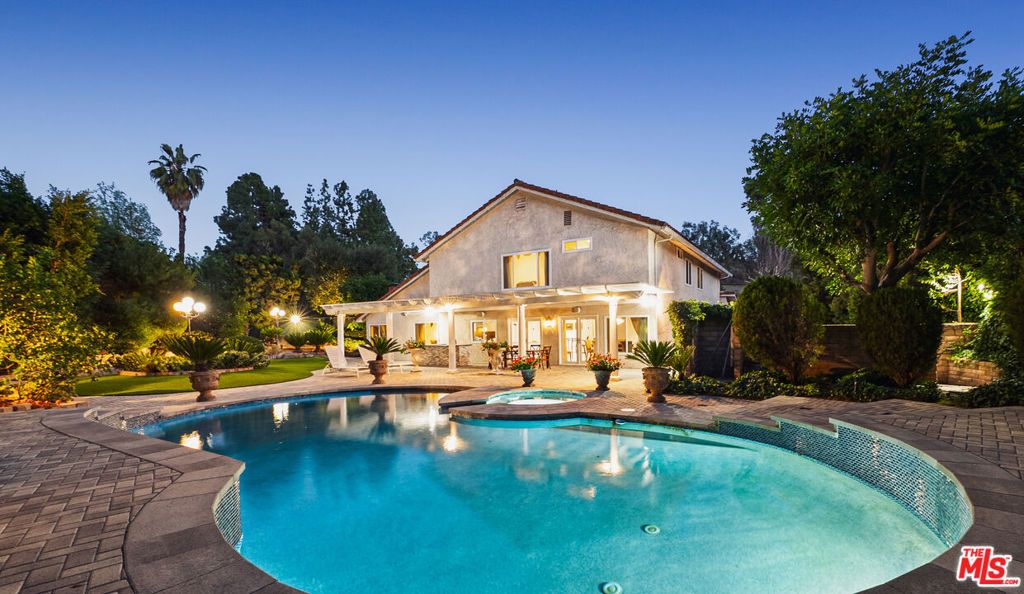 Photo of 16230 Meadowcrest Road, Sherman Oaks, CA 91403 (MLS # 26653639)