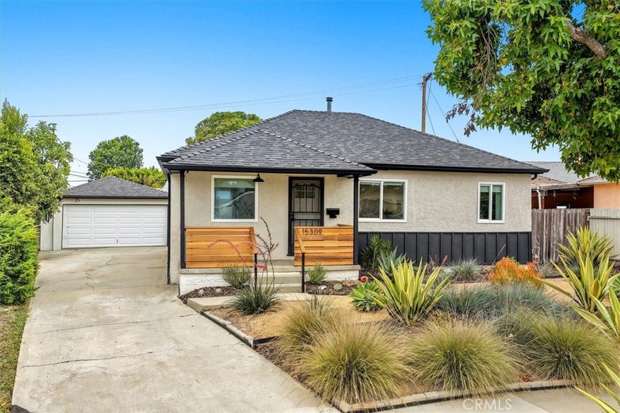 On a quiet, tree-lined street in El Camino Village, this home blends timeless charm with extensive renovations. The location is tucked off the main road with less traffic, beautiful mature trees —perfect for morning and evening walks. Inside, the home feels open, light, and warm, with a down-to-studs kitchen and bath renovation featuring quartz counters, stainless steel appliances, new cabinetry, tile, dishwasher, sink, and under-sink RO filtration system, plus updated piping and modern finishes in the bath. New dual-paned windows and doors, laminate floors, refinished hardwoods, recessed lighting, a custom porch fence, and drought-tolerant landscaping with fruit trees all add to the appeal. Major upgrades include a new water heater, updated 200A electrical panel, PEX piping, and a new HVAC system with heat pump. The backyard offers a covered patio, and privacy, with a detached garage, new slab and door, and a long driveway with RV potential. All this just minutes from Alondra Park, El Camino College, shopping, dining, freeways, and ~5 miles to the beach. Zoned for California Distinguished Mark Twain Elementary.