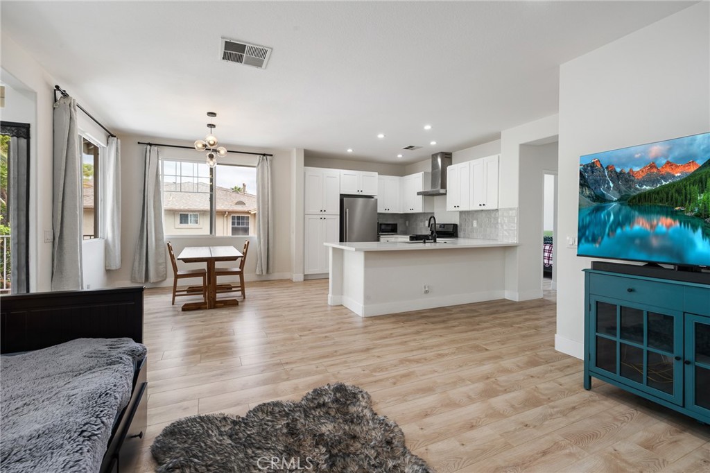 This stunning, fully renovated end-unit townhouse is nestled within the private, gated community of Dominguez Hills Village. Soaring high ceilings flooded with natural light welcome you into this gorgeous, turnkey home. The second story boasts a bright and airy open floor plan featuring a fully upgraded kitchen that seamlessly opens into the sun-splashed living and dining area, complete with access to your own private balcony.
This home features two spacious bedrooms and two remodeled bathrooms. The primary suite has been beautifully upgraded with a separate double sink vanity and offers a huge walk-in closet. This well-equipped townhouse also features a large laundry room, a convenient 2-car garage with direct access, a 210V Tesla charger, and central AC and heat. The AC unit and water heater were recently replaced approximately three years ago, offering enhanced efficiency and peace of mind.
Located in a wonderful, resort-like community, residents enjoy an array of amenities including a huge pool/spa, fitness center, basketball and tennis courts, a kid's park, a dog park, and on-site HOA management.