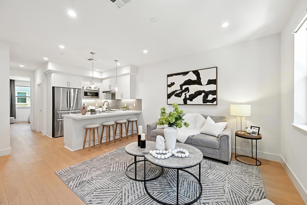Step into contemporary living in this stunning 2022-built TownHome, it offers the perfect blend of style, comfort, and functionality in a prime Mountain View location. The open-concept living and dining area is filled with natural light, featuring sleek finishes and a seamless flow that makes both everyday living and entertaining a joy. The chefs kitchen boasts a large island, quartz countertops, stainless steel appliances, and ample cabinet space designed for both practicality and elegance. On the second floor, a private bedroom with a full bath provides flexibility for guests, extended family, or a dedicated home office. The third floor features two spacious bedrooms, each with its own ensuite bathroom, offering privacy and convenience for every household member. Move-in ready and equipped with solar panels, this home combines energy efficiency with modern comfort. Located close to top-rated schools, major tech employers, shopping, dining, and parks, it delivers an exceptional lifestyle in the heart of Silicon Valley. This is more than a homeits a lifestyle, waiting for you to make it yours.