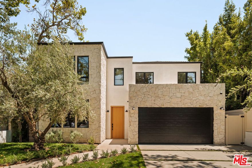 Located in the highly coveted Colfax Meadows neighborhood, this stunning brand new construction home offers the perfect blend of modern luxury and timeless design on a charming corner lot. Featuring six bedrooms, seven bathrooms, a custom primary suite with soaking tub and walk-in closet, a spacious movie theatre, this home is thoughtfully designed for both convenience and entertainment. The detached guest house provides a full one bedroom with ensuite bath, living room and kitchenette. The beautifully landscaped backyard is a true oasis, complete with a sparkling pool/spa, bbq and outdoor dining, ideal for both relaxation and entertaining. Situated just minutes from major studios in Hollywood and Burbank, this home also offers easy access to the Studio City Farmers Market, popular shops and dining along Tujunga and Ventura Boulevard, and key freeways including the 101, 134, and 170. Located within the boundaries of top-rated schools, including the highly regarded Carpenter Community Charter, this property offers an unbeatable lifestyle in one of Studio City's most desirable communities.