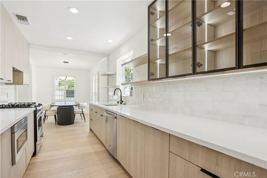 Newly Renovated Sherman Oaks home featuring top-notch designer finishes throughout. Modern open concept floor plan floods the home with natural light. Beautiful modern chef's kitchen displaying brand new stainless steel appliances, quartz countertops, and custom cabinetry. Spacious living room with fireplace and glass sliding doors leading to the yard. All open areas are fitted with plenty of cabinets for storage space throughout. The beautiful entertainer's backyard boasts a large grassy area, a finished deck perfect for outdoor dining, and an above ground hot tub. Huge primary bedroom displays vaulted ceilings, a large walk-in closet, and sliding doors that lead to the yard. Luxurious primary bathroom with double vanity and walk-in shower. Situated on a tree-lined street in the heart of Sherman Oaks and just minutes from the best shops, restaurants, and top rated schools.