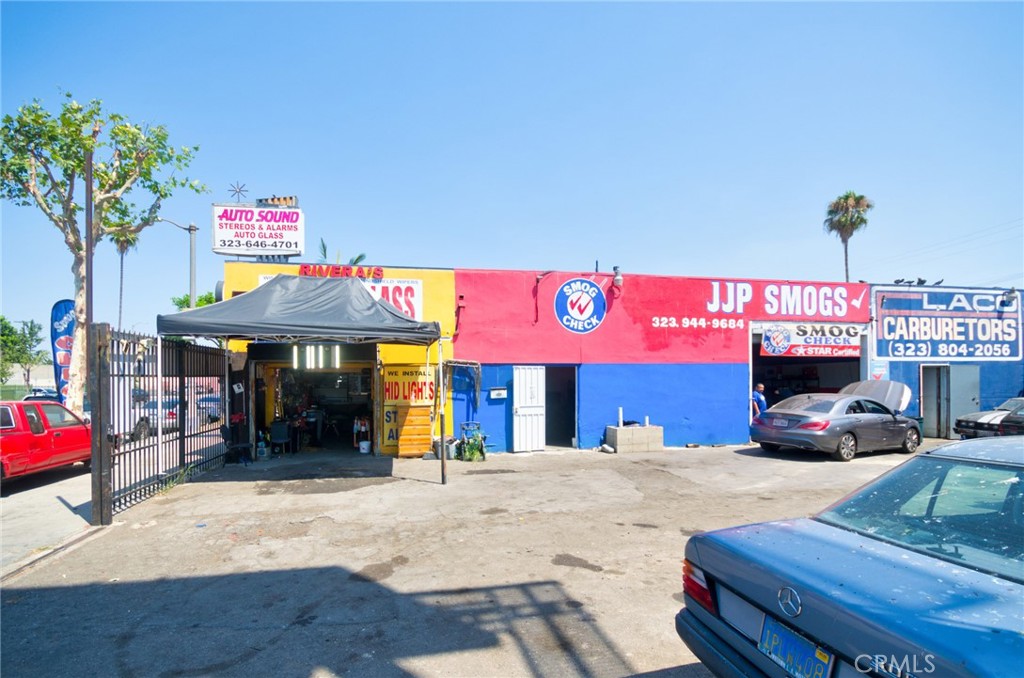 Great income property for investors with 3 auto mechanic professional stores on property, one being an auto glass store, one is smog check shop, and 3rd is auto repair shop. All tenants are good long term tenants. Property also has a billboard ad that pays every month. Total income for all 3 shops and billboard is $5000/month. Owner never raised tenants rent so new owner can sign new lease with tenants for much higher rent rates. Location is in prime location with tons of traffic. Property has never had vacancy. Dont miss out on this investment opportunity !