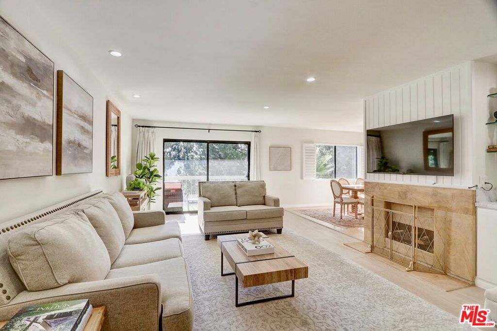 Set in the hills of Bel Air, this beautifully maintained two-bedroom, two-bathroom residence offers peaceful canyon views, spacious interiors, and a prime location within one of Los Angeles most desirable communities. The open living and dining areas are filled with natural light and lead to your balcony overlooking lush canyons, perfect for morning coffee or evening unwinding. The kitchen features stainless steel appliances, ample cabinetry, and a functional layout ready for everyday living or effortless entertaining. Both bedrooms are generously sized, with the primary suite offering tranquil hillside views, a walk-in closet, and an ensuite bath. The secondary bedroom is ideal for guests or a home office. Well cared for and freshly painted, this home is move-in ready. Additional features include in-unit laundry hookups, central HVAC, and abundant storage. Residents enjoy access to the pool, fitness center, dry sauna, and peaceful walking trails that lead to a secluded zen garden. Just minutes from Roscomare Elementary and conveniently located near Beverly Hills, Westwood, and Sherman Oaks, this home combines privacy, practicality, and an exceptional Bel Air address.