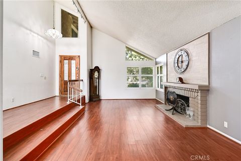 Photo of 10 Bluff Point Cir, Phillips Ranch, CA 91766 (MLS # SR26003734)