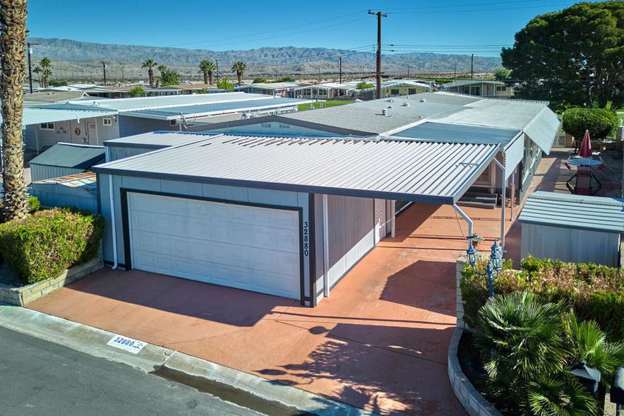 Affordable Golf-Course Home in Tri Palm Estates & Country Club!Enjoy panoramic mountain, fairway, and pond views from this beautifully updated home located on the 2nd fairway in the sought-after 55+ community of Tri Palm Estates. Large picture windows in the living room frame the stunning scenery, while the finished California room provides extra space for a cozy breakfast area, media lounge, or sunlit retreat.The updated kitchen features stainless steel appliances, a center island, and abundant cabinetry. An open floorplan connects seamlessly to the formal dining area, creating an ideal layout for both everyday living and entertaining. The home offers 2 bedrooms and 2 updated bathrooms, along with a generous wraparound patio perfect for gatherings or simply enjoying the peaceful golf-course setting.  Additional highlights include a two-car garage with plentiful storage and an extra storage shed. Located on a quiet cul-de-sac just moments from the community clubhouse, this home combines privacy with convenience. It's turnkey furnished, includes all appliances and is move-in ready for you!Tri Palm Estates is an active 55+ community where you own the land, and ownership includes unlimited free golf on both the 18-hole course and 9-hole par-3 course. Residents enjoy pools, spas, tennis, pickleball, shuffleboard, basketball, a putting green, and a vibrant clubhouse with a banquet room, restaurant, bar, billiards, and free Wi-Fi.  Ideally situated near Costco, Home Depot, Eisenhower Health, the Agua Caliente Casino, Acrisure Arena, and just minutes from shopping, dining, and entertainment in Rancho Mirage, Palm Desert, and downtown Palm Springs--all with easy access to I-10.