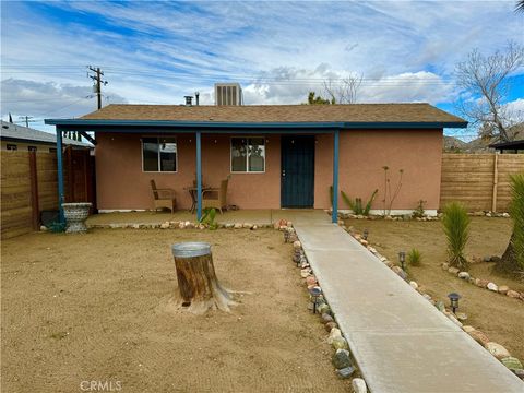 Photo of 7138 Tamarisk Ave Ave, Yucca Valley, CA 92284 (MLS # JT26048982)
