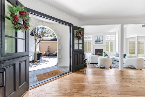 Photo of 19365 Woodlands Drive, Huntington Beach, CA 92648 (MLS # OC25106857)