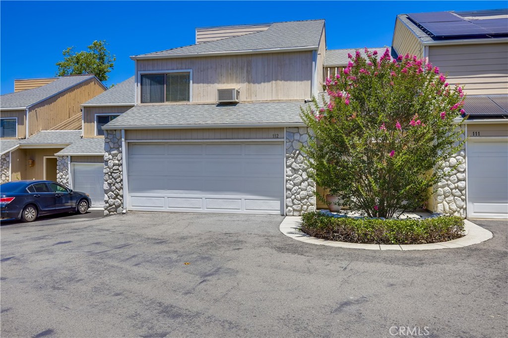 Superbly located spacious 1 bedroom 1 Bath unit in prestigious guard gated Coto De Caza in The Village nestled amongst rolling hills within walking distance of exclusive Coto De Caza amenities including Coto Valley Country Club, Coto Equestrian Preserve, Golf Courses, local parks, and numerous hiking and biking trails. The sunny front courtyard entrance creates a welcoming first impression. Step inside the main level entrance to unit A and soak in the soaring two story vaulted open beam ceilings and the light filled open concept floor plan. The main living area boasts a cozy fireplace and sliders opening to the wrap around private patio creating an ideal space for indoor-outdoor living. The living area is open to the dining area and kitchen providing a flexible living space. The kitchen boasts stainless steel appliances and a prized breakfast bar. The bedroom is located on the same level with mirrored closet doors, a full bathroom, and sliders opening to a second patio space, perfect for relaxing and BBQing and enjoying a glass of wine with loved ones. This unit also boasts a laundry closet just next to the front door entry and 2 garage parking spaces in the attached garage. Just steps from the community pool, Coto Pickleball Club, and Live Oak Park with tranquil and serene walking paths, you can’t beat this location. Landlord pays all utilities!