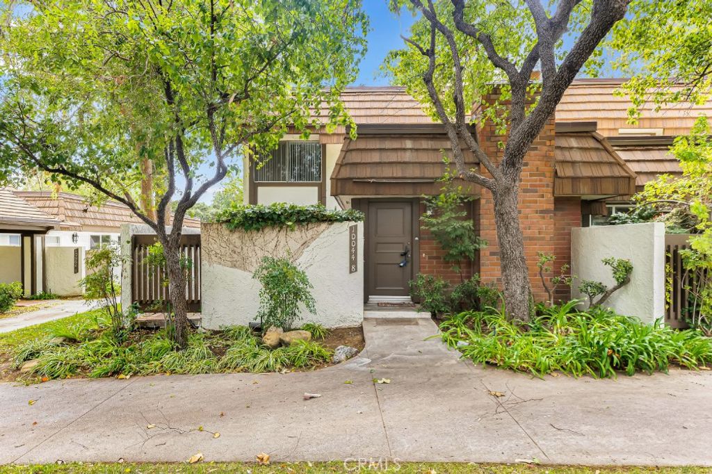 Photo of 10044 Larwin Avenue #8, Chatsworth, CA 91311 (MLS # SR25220787)