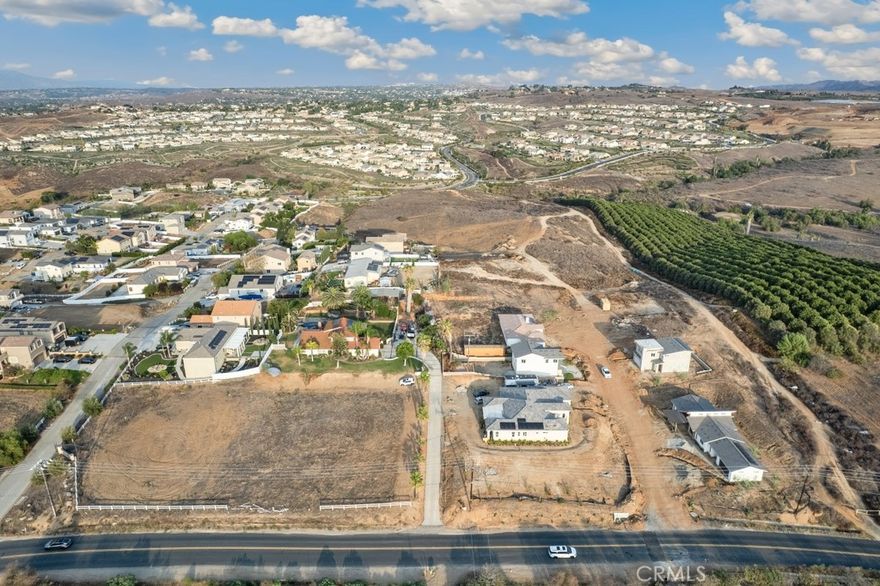 Large Riverside Lot with Panoramic Views – Build Your Dream! Don’t miss this rare opportunity to own 16,117 sq. ft. (0.37 acres) of prime residential land in the highly desirable Riverside Unified School District. Zoned R-A-1 (Residential Agricultural), this spacious lot offers endless possibilities—build your custom estate, create a multi-generational property, or develop a unique investment project. Set in a peaceful rural setting with stunning hill and mountain views, the property combines natural beauty with convenient access to schools, shopping, dining, and major freeways. For those with a bigger vision, the seller is also offering the adjacent lot at 57 Via Verrazano for sale—perfect for expanding your property or developing multiple homes.
