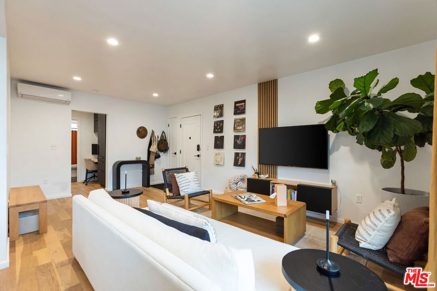 MOTIVATED SELLER! California soul and iconic Palm Springs vibes come together at this cool 8-unit Tenants in Common (TIC) community in West Hollywood. This upscale rehabbed unit brings a keen eye for design with matte oak flooring, crisp white walls, earth tones and organic elements throughout. This gorgeous mid-century upper level one bedroom, one bathroom, offers spacious, light-filled rooms with ample closet space and a south-facing balcony. Featuring designer lights and fixtures, an amazing bath and kitchen with high end appliances, in-unit washer and dryer, AC & heat, subterranean parking including one spot, and an additional private storage room. Recent upgrades include new hallway cabinetry with a standing desk, upgraded closets with new shelving, Roman clay paint in the bedroom, and smart home features including Lutron lighting and front door Yale lock. Also, HOA is only $300 per month! This rare find is in a great Weho location, just a quick walk to Melrose Place, the Sunday Farmer's Market, Strings of Life, the Roger Room, La Boheme, the Peppermint Club, Holloway House, and downtown West Hollywood. Also close to the best coffee shops, boutiques and cafes on Melrose and Beverly. This one is too fabulous to miss!