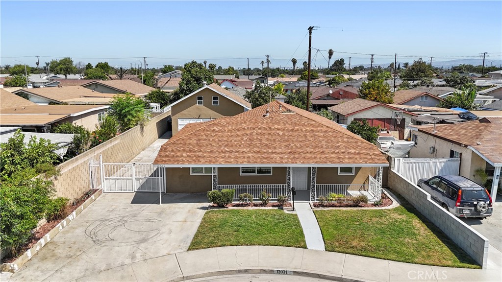 Minutes to Cerritos College! Welcome to this updated Norwalk home offering approximately 1,500 sq ft of living space. The main home features a flexible floor plan with 3 bedrooms and 1 full bathroom, plus a private Master suite with its own bathroom for a total of 4 bedrooms (per seller). Recent upgrades include a new roof, a beautifully remodeled kitchen with an adjoining dining room, updated bathrooms, fresh interior paint, new doors, energy and water-efficient fixtures, and upgraded plumbing & electrical. Outside, a long-gated driveway leads to a spacious 2-car garage with a bonus studio above - perfect for a home office, creative space, or guest area and a second studio with bath at ground level (both unpermitted). The large concrete yard provides ample space for multiple vehicles, projects, or play. Conveniently located near shopping, dining, Cerritos College, and easy access to the 91 & 605 freeways, this property is perfect for multi-generational living or those seeking extra space for work or hobbies.