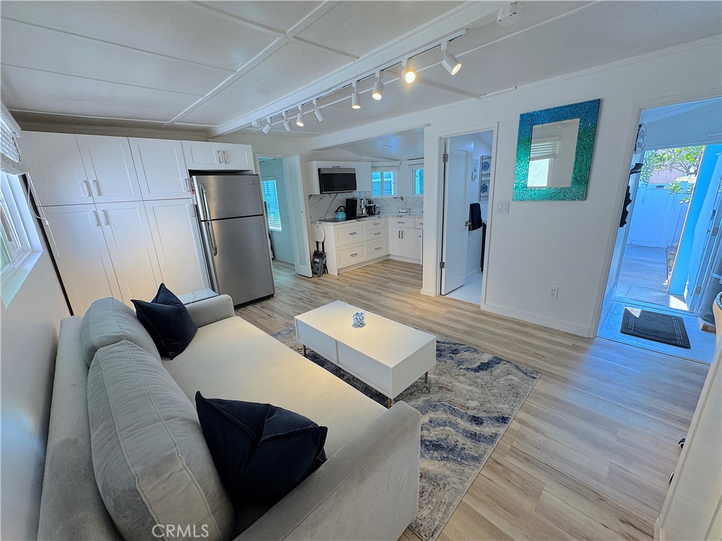 Recently remodeled and fully furnished ADU located across the street from the beach in South Redondo. Approximately 700 sq. ft. with a private entrance. Enjoy easy access to the sand, and walk to the Redondo Pier, Riviera Village, restaurants, coffee shops, bars, markets, banks, yoga and Pilates studios, and retail shopping.
The unit features a brand-new kitchen equipped with an electric stove, microwave, toaster, air fryer, and a specialty espresso machine—ideal for everyday cooking or entertaining. The home also includes a high-quality water filtration and softener system for added comfort.
Inside, the bedroom is furnished with a comfortable queen-size bed, and the custom-made sofa in the living area is designed to accommodate sleepers of all kinds, offering flexible and restful sleeping arrangements.
Updated bathroom, new flooring, fresh paint, and split AC system included. The unit is move-in ready, fully furnished, and set up for long-term living.
Street parking available.All furnishings included.
Located in the heart of Redondo Beach, just minutes from Riviera Village and the Redondo Pier. Enjoy ocean breezes in the morning and sunset walks in the evening. Coastal living made easy—schedule a showing and see for yourself.