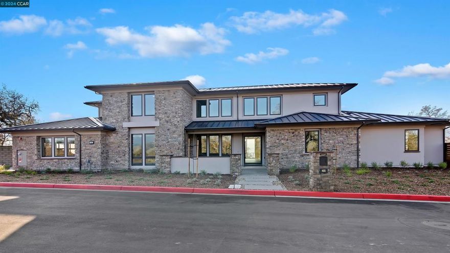 Experience the 360 degree views of surrounding mountains & panoramic vistas from this magnificent, private, brand new, nearly 5,000 sq. ft. residence. A 3.22 acre entertainer's dream estate, the residence is located on Legacy Drive,an exclusive gated enclave of 13 estate properties stretching out high above Alamo & Walnut Creek, w/ awe-inspiring vistas from Mt. Diablo to the Sacramento River, toward Napa & SF Bay. Glass & metal entry doors welcome you into the residence w/ its hardwood floors, 2 glowing fireplaces, soaring ceilings & walls of windows. Handcrafted detail including a Lutron Lighting System w/ rich millwork is in evidence t/o. A private 1st floor wing incorporates a spacious master suite w/ a cozy fireplace & doors to your outside Loggia w/ its own fireplace that overlook the rolling hillsides. Also on this floor is an office, richly detailed w/ its own private entrance. Discover the gourmet chef's kitchen w/ an ample pantry featuring a Sub-Zero Refrigerator, Wolf Appliances & a wine refrigerator, open to the spectacular family room that creates a seamless flow, w/ bi-fold walls of glass that open to access the rear patio & Loggia for western sunsets. Upstairs, you'll find 3 bedrooms w/ private baths, a secondary laundry room,  a hobby room & an expansive playroom..