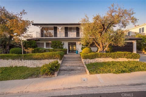 Photo of 890 N Hillside Drive, Long Beach, CA 90815 (MLS # RS26166174)