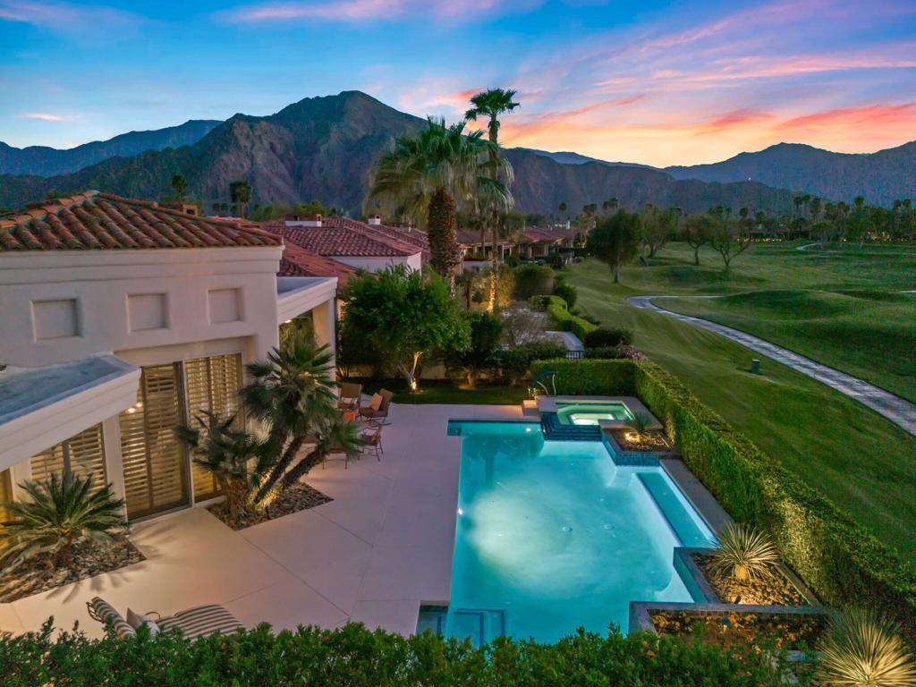 THE CITRUS: **OPEN THIS SAT 7/26 & SUN 7/27 11:00AM-1:00PM. COME SEE!!** Love sipping a cocktail while watching the sun set behind the mountains? Want spectacular mountain, lake and fairway views? Want a big, beautiful pool and spa? Want to be able to move right in without doing renovations? This home checks your boxes!! Light, bright, clean and fresh - this home is beautifully positioned right on the 18th fairway of The Citrus Club. Enjoy a stunning backdrop of the Santa Rosa and Little San Bernardino Mountains from a light-filled, open-concept floor plan designed for effortless indoor-outdoor living. The spacious backyard is a private oasis, complete with a large pool and spa--perfect for relaxing and entertaining. Inside, you'll find three generous en suite bedrooms, including a privately situated primary suite that offers comfort and seclusion. At 3,306 square feet, this residence blends luxury with space, privacy and function. The Citrus Club is affiliated with the iconic 5-star La Quinta Resort, and features scenic walking and biking paths, citrus groves, 24-hour security, and low HOA dues. Just minutes from top-tier golf, tennis, dining, spas, and shopping, this home presents a rare chance to own in one of La Quinta's premier communities.