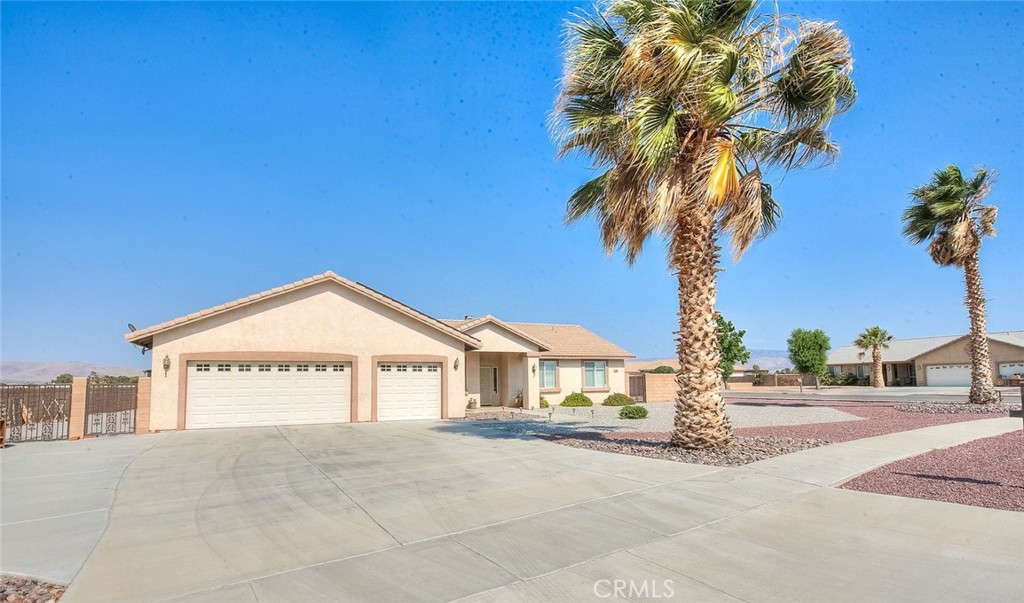 Spacious 4-bedroom, 2-bath home with 2,094 sq ft of living space on a ½-acre lot in a desirable neighborhood. Located in a quiet cul-de-sac, this property features an open-concept kitchen, inside laundry, and a 3-car garage. Recent upgrades include a new A/C unit and water heater. A full retainer wall surrounds the property for added privacy and security. Enjoy stunning valley views, RV access, and plenty of outdoor space. A rare find with room to grow!