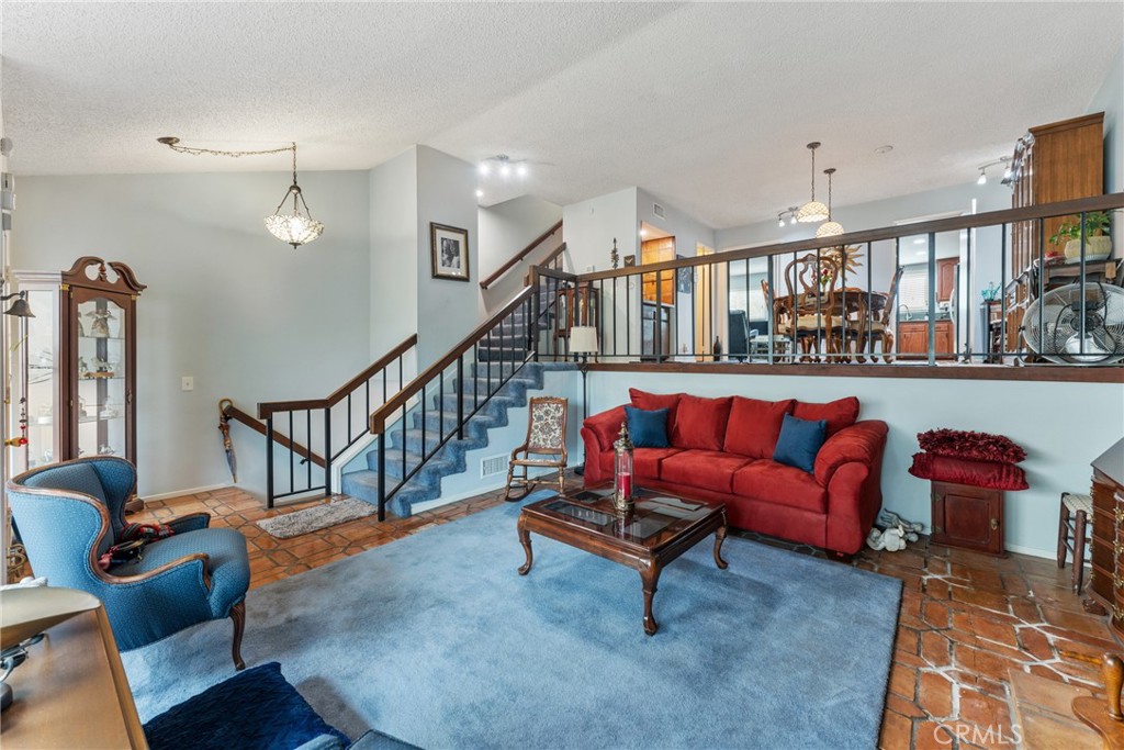 Back on Market at no fault to seller - Buyer unable to perform. Welcome to your new home in Buena Park! Bordering Cypress and just a short walk to Cypress College, this well-maintained 3-bedroom, 2.5-bathroom townhome offers both comfort and convenience. The main living area provides a warm and inviting space, with a large kitchen tucked privately toward the back of the home—perfect for meal prep and entertaining.
Upstairs, you'll find tastefully renovated bathrooms that add a modern touch. A brand-new air conditioning and furnace system, along with all new ducting, ensures year-round comfort.
This unit is quietly situated at the rear of the complex, offering a quiet area away from the main road. The community features a sparkling swimming pool, jacuzzi, and clubhouse— great for enjoying California’s sunshine and social gatherings. With a large two-car garage, you’ll have plenty of space for parking and storage.
With a bit of imagination and your own personal touch, this home presents a wonderful opportunity to create your dream space in a desirable location.