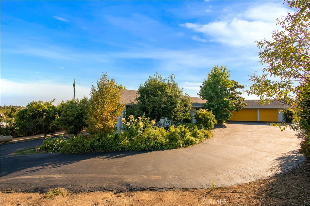 Opportunity, opportunity, opportunity!
Opportunity abounds in this original sprawling single-story home in the rarely-on-the-market prestigious Tumble Creek Estates where renovated properties sell for well over a million dollars. This home features a total of 4 bedrooms, 3.5 bathrooms, and a 3-car garage (with a sink and toilet), all set on a very private and usable almost flat 1.17-acre private lot. The main residence is approximately 1,947 sq. ft. and has 3-bedrooms and 2 baths and boasts soaring wood-beamed ceilings. In addition to this square footage is an attached 1-bedroom, 1-bathroom studio which provides incredible versatility—ideal as an in-law suite, private office, art studio, or income-generating ADU, bringing the total square footage to around 2,250 sq ft.
The open-concept kitchen, complete with a large wrap around counter with seating and stainless-steel appliances (range and double ovens are almost new), flows seamlessly into the oversized dining and family room with cozy fireplace—ideal for entertaining. The kitchen has two separate dining/eating areas plus a built-in desk.
Outdoors, enjoy the peaceful privacy of your nearly flat lot with southwest-facing views toward Sleeping Indian. There's ample room to add a pool, workshop, or further customize the landscape to your vision. The covered rear patio and California sunroom offer extended outdoor living spaces, perfect for enjoying Fallbrook’s mild climate year-round.
You are surrounded by million-dollar homes, plenty of room for expansion, and low HOA and taxes.
Whether you're looking for a multi-generational estate, a forever home, or a property with income potential, this gem in Tumble Creek checks every box.
This rare 1.17-acre property offers the best of upscale country living with the convenience of being just minutes from charming downtown Fallbrook—known as the Friendly Village for its warm community, rolling hills, wineries, golf, local casinos and near the 15 Freeway.
Don't miss this one-of-a-kind opportunity—schedule your private tour today!