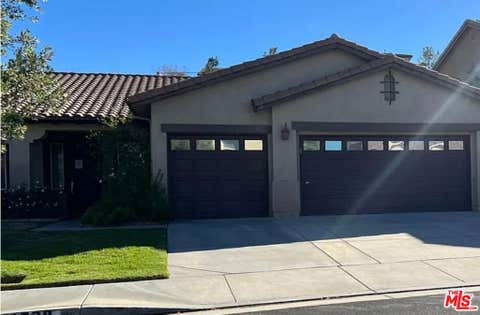 Photo of 29538 Big Bend Place, Canyon Country, CA 91387 (MLS # 26867929)