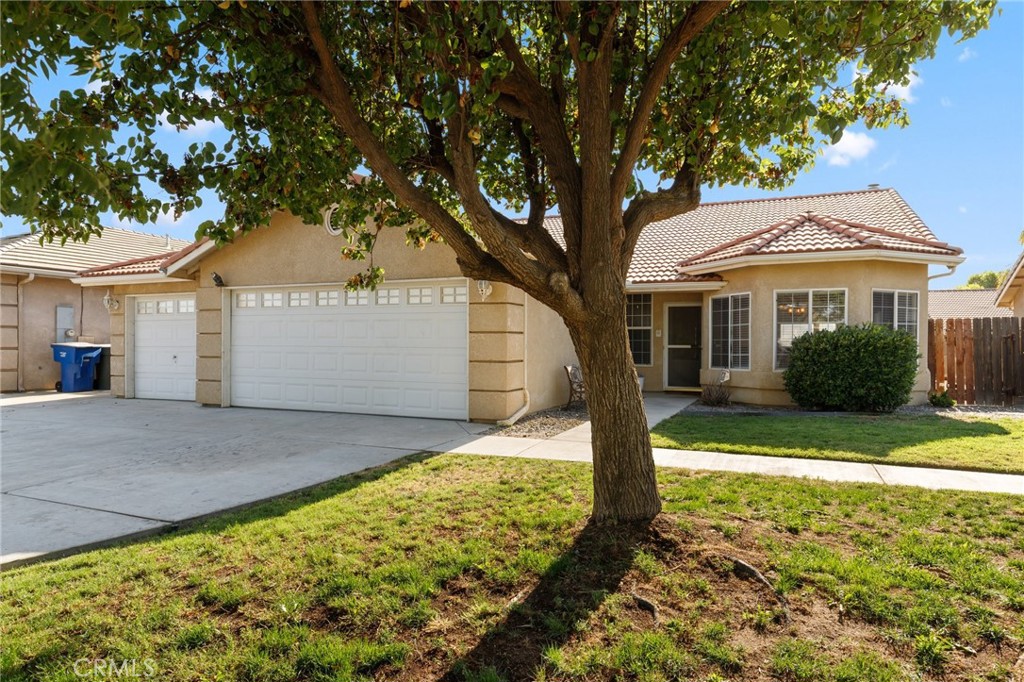 This beautifully maintained ranch-style home offers the perfect blend of comfort and convenience, featuring a 3-car garage, an in-ground pool, 4 bedrooms, and 2 full bathrooms. Inside, enjoy brand-new flooring and carpet (installed June 1, 2025). New paint uniform throughout the house. The kitchen boasts granite countertops, providing both style and durability. Additional upgrades: whole house fan, reverse osmosis in kitchen, intercom system with radio, built in hutch in the kitchen, fireplace mantle, and hard-wired security system. Master bedroom has a sliding glass door that opens up to the backyard. Located near Naval Air Station Lemoore, Lemoore Golf Course, Surf Ranch Sports Complex, and PW Engvall Elementary School, this home offers easy access to recreation, top-rated schools, and local amenities. Nice, quiet neighborhood close to the elementary school (P.W. Engvall Elementary).
