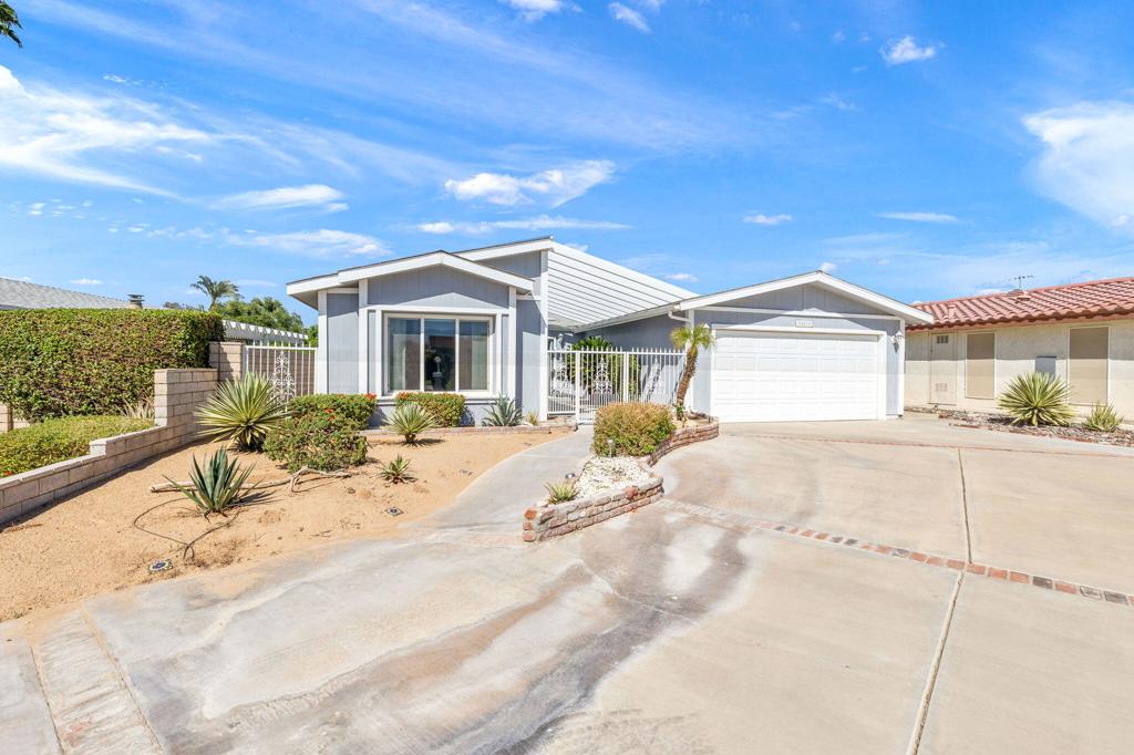 Affordable Living with Style, Comfort and Location. Near everything! Acrisure Arena, Shopping, Restaurants, Banking, Palm Desert, Palm Springs.This beautifully appointed home offers an exceptional blend of style, comfort, and a prime location. It is completely move-in ready and features tasteful furnishings throughout.Within the next two weeks, the adjacent golf course and green belts will be transformed with newly grown grass, creating stunning fairway,