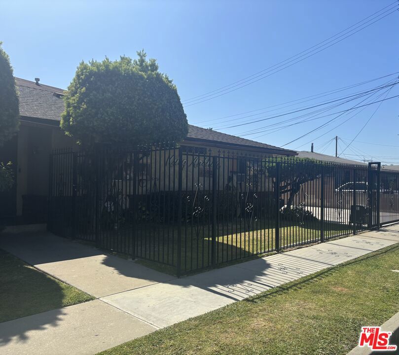Spacious and beautiful 2 story townhouse in excellent condition for sale in the beautiful city of Paramount! It has 2 spacious bedrooms with walk-in closets and 1.5 bathrooms with granite countertops. The large eat-in kitchen has granite countertops and plenty of cabinet space. The spacious living room has beautiful wood flooring. The unit has a large walk in storage space under the staircase. Private 2 vehicle carport with large overhead storage cabinets. Low monthly HOA dues take care of trash, lawn, and water. Easy access to freeways, schools, shopping, dining. This is a must see! Best priced home price per sq. foot in the Paramount!