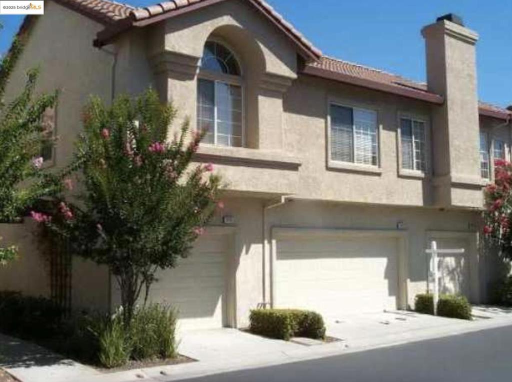 Fantastic home in sought after location with four bedrooms and a two car garage. This home has Fresh Interior Paint, Partial flooring replacement in some areas. A fireplace and a soft neutral color palette create a solid blank canvas for the living area. The primary bathroom features plenty of under sink storage waiting for your home organization needs. Inside laundry too. Full bedroom and bath downstairs. The community offers playgrounds, community pool and a club house. Conveniently located to BART, 580/680, Iron Horse and arroyo network of trails, parks, historic downtown Pleasanton, A must see!