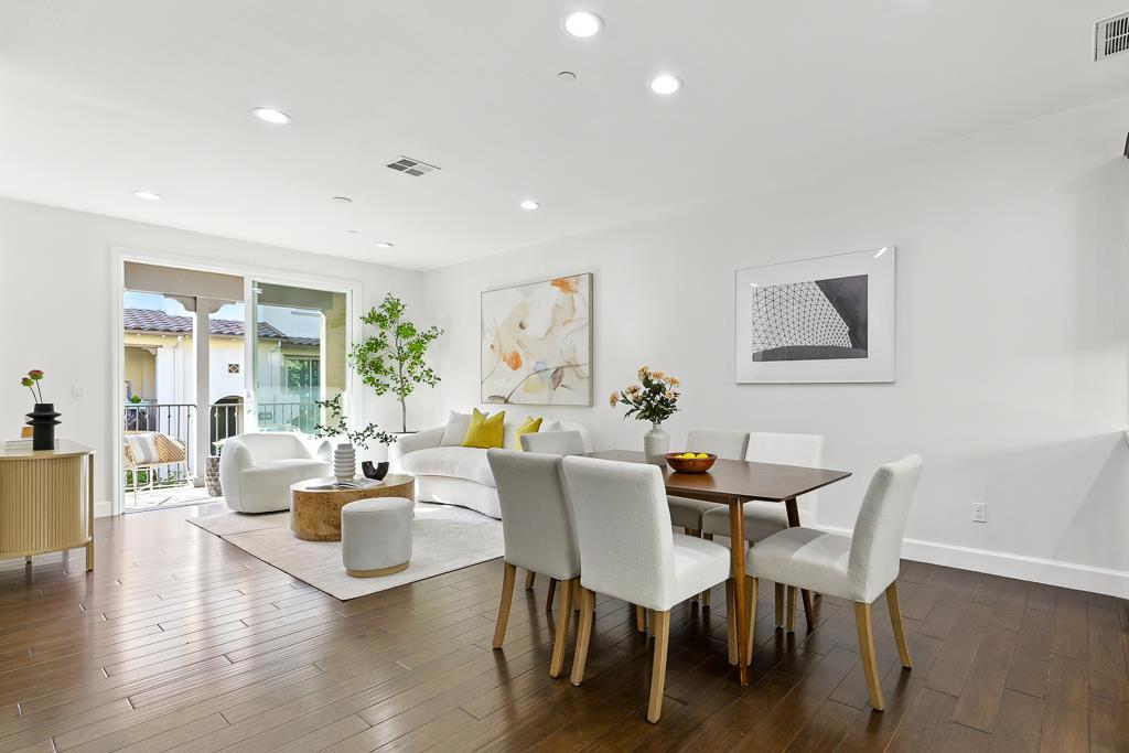 Welcome to this spacious 4BR/3.5BA townhouse, ideally located in the desirable Las Palmas Community. Offering 1,845 sq ft of living space, this home features an inviting open-concept layout that seamlessly connects the living, dining, and kitchen areas. Enjoy a private balcony, engineered hardwood floors, and recessed lighting throughout the main level. The gourmet kitchen is equipped with granite countertops, stainless steel appliances, ample cabinetry and a large island with breakfast bar. A full bedroom and bathroom on the first floor provide the perfect setup for guests or a home office. Upstairs, youll find three additional bedrooms, including a spacious primary suite with a walk-in closet and a luxurious en-suite bath with dual sinks. Additional highlights include fresh interior paint and an attached two-car garage. Well-maintained community with amenities including a playground, BBQ area, and clubhouse. Convenient access to Trader Joes, Whole Foods, Target, Sunnyvale Public Library, Las Palmas Park, and Washington Park. Minutes from top private schools such as BASIS, Challenger, and Stratford, as well as highly rated public schools. Just a short drive to major tech campuses including Google, Apple, LinkedIn, NVIDIA and more. Come make this your home!
