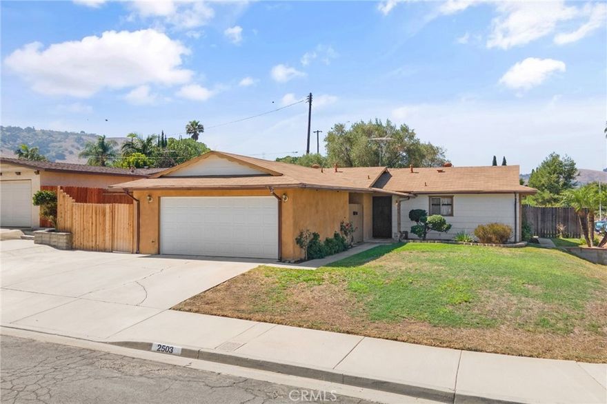 Welcome to 2503 Abonado Pl—a lovingly maintained single-family home cherished by the same family for 57 years. This 3-bedroom, 2-bathroom single-story residence is situated on an expansive 7,000+ sqft corner lot within a quiet cul-de-sac in the desirable community of Rowland Heights. Numerous upgrades include a new water heater, PEX re-pipe, new garage door and opener with battery backup, upgraded electrical panel, new ABS drain connections at main sewer line, new dishwasher, new oven, new stovetop, new range hood fan, an expanded driveway, and more. The private backyard features a large covered patio, fruit-bearing orange tree, raised planter beds, and lush grassy area shaded by a beautiful mature olive tree—perfect for relaxing, BBQ-ing, entertaining and hosting gatherings. The 2-car garage, attached by a spacious breezeway, offers ample storage and parking space, as well as hookups for your washer and dryer. Conveniently located near top-rated schools, parks, shopping, dining, and major freeways, this home offers comfort, convenience, and an incredible opportunity to own in the sought-after city of Rowland Heights. Note: some photos have been virtually staged