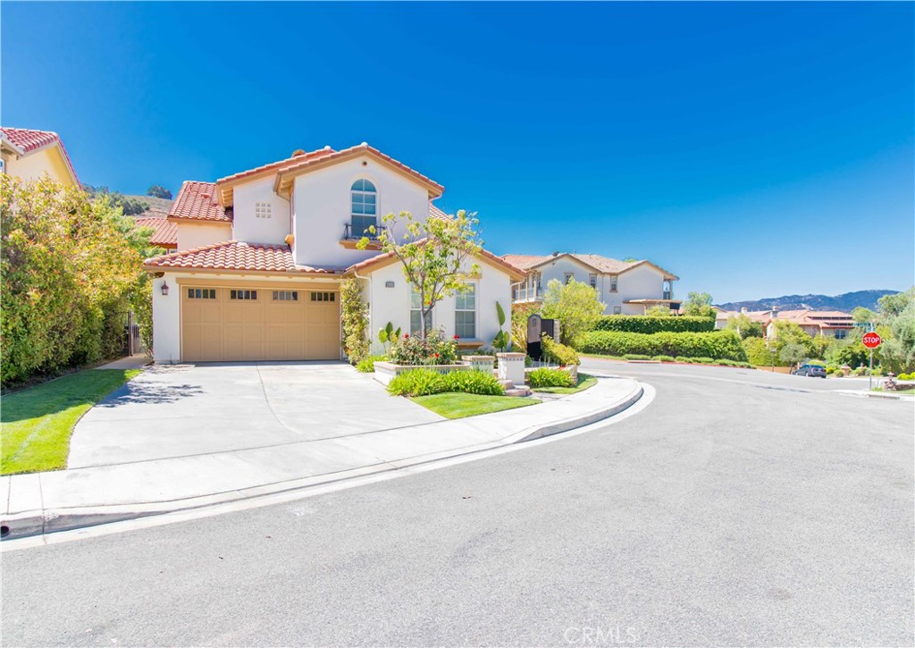 Open House August 24, From 2PM- 4PM.
Awaken in Paradise Enclave! This stunning home grasps tons of natural light and an amazing floor plan. Upgrades are evident throughout this beautiful 2006 built home from the kitchen with custom cabinetry, granite counters, stainless steal appliances to custom made center island. Move-in ready with new paint, new carpet, beautiful floors and plenty of built in storage.
High ceilings, recessed lighting and an open floor plan make it comfortable for living and entertaining.
The master bedroom suite upstairs has a large stone shower, soak spa tub, dual sink vanities, and an extensive walk-in closet. Two additional bedrooms are located upstairs as well and a guest bedroom downstairs.
This enclave of 48 luxury homes features a community pool, spa, and playground.
Located on the cul de sac in the neighborhood this corner home is light and bright with a "courtyard entry" and charming patio. Located in Calabasas close to Malibu Beach and The Commons.