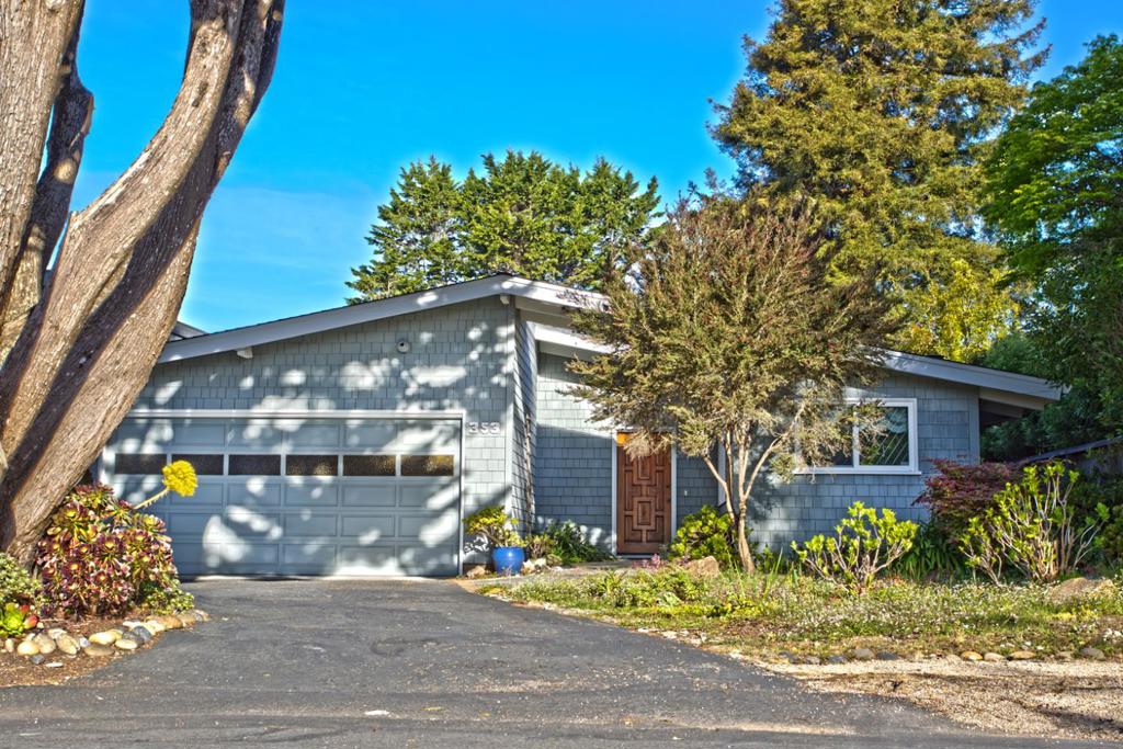 Single level in great Rio Del Mar location. Just over 100 yards to end of street and bluff. Has private, shingle siding look set off street with beautiful old Cypress tree in front. Private back yard with low maintenance landscaping. Open beam ceiling with wood paneling. Very light and open floor plan with view and easy access to pleasant back yard.
