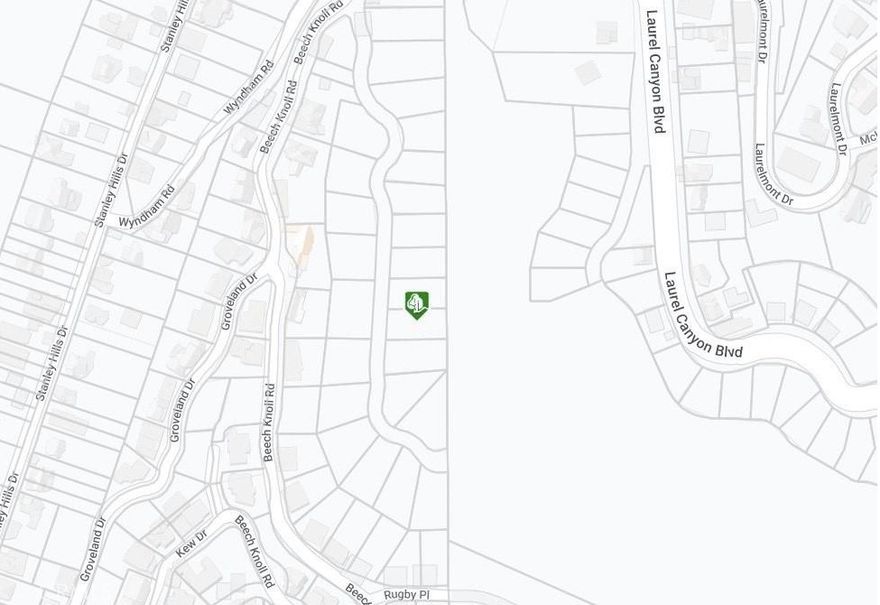 Vacant land Zoned LAR1 in the Hollywood Hills with city views. Paper road (No restrictions on the development of a new road.) 5,959 square feet (Google Maps GPS coordinates 34.110361, -118.374857) Assessor ID: 556-7007-012 Water and electricity infrastructure nearby. For specific questions or details, it is advised to consult the City of Los Angeles Building and Safety department.