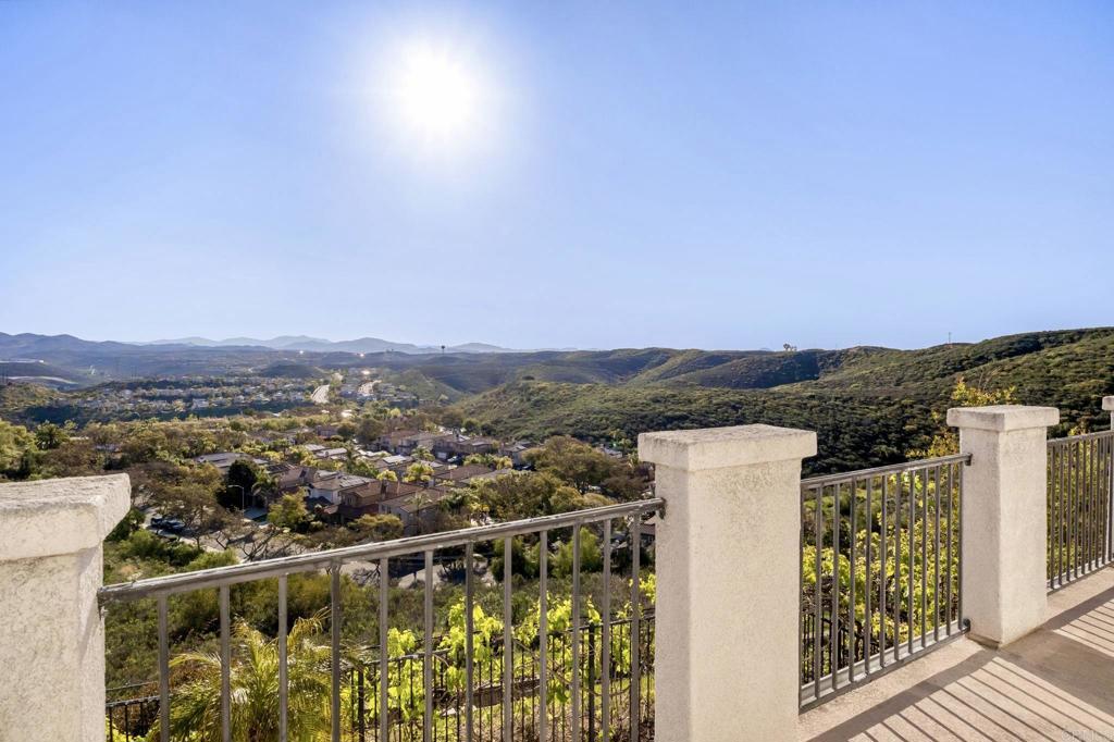 Seller will entertain offers between $1,399,000-1,440,000. Breathtaking canyon and mountain views take center stage in this beautifully maintained 3-bedroom home, perfectly positioned on a desirable corner lot in the sought-after Versante neighborhood. The open floor plan is light and bright, enhanced by fresh paint and crown molding throughout. The fully updated kitchen boasts sleek quartz countertops, modern fixtures, brand-new appliances, and a stylish island with waterfall countertops. A brand-new water heater adds convenience. Upstairs, the spacious primary suite features an oversized balcony to take in even more of the stunning views, creating the perfect retreat. The upper level has been upgraded with luxury waterproof vinyl plank flooring for a modern and durable touch. Noise-blocking windows and sliding doors help minimize outdoor sound, while maintaining the home's airy ambiance. Ample parking ensures convenience for you and your guests. With only 27 homes in this close-knit community, the property is truly unique and features a pleasant picnic area maintained by the HOA. Located in the highly desirable Scripps Ranch area, this home provides access to top-rated schools in both the Scripps Ranch and Poway Unified School Districts. Enjoy the perfect blend of comfort and accessibility, with shopping, dining, entertainment, and the 15 freeway just minutes away. Don’t miss the opportunity to make this stunning property your new home!