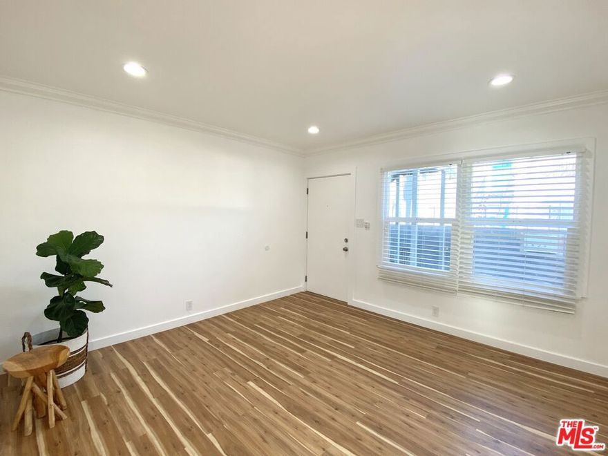 Light-filled ground floor 1BD/1BA unit with open-concept layout and in-unit laundry. Recently remodeled and freshly painted throughout, featuring a reimagined kitchen with newer shaker cabinets, quartz countertops and sink, and stainless steel appliances. Enjoy multiple outdoor space options including common areas shared with only 3 other units, or go across the street to Ishihara Park - a perfect place to stroll with or without a four legged friend. Centrally located near shops, cafes, restaurants, parks, business centers, SMC, local art centers along with easy access to the I-10 or Expo line. From fresh flowers at the Pico Farmers Market on Saturdays to bike rides and sunsets at the beach - live in the heart of it all and experience it all!