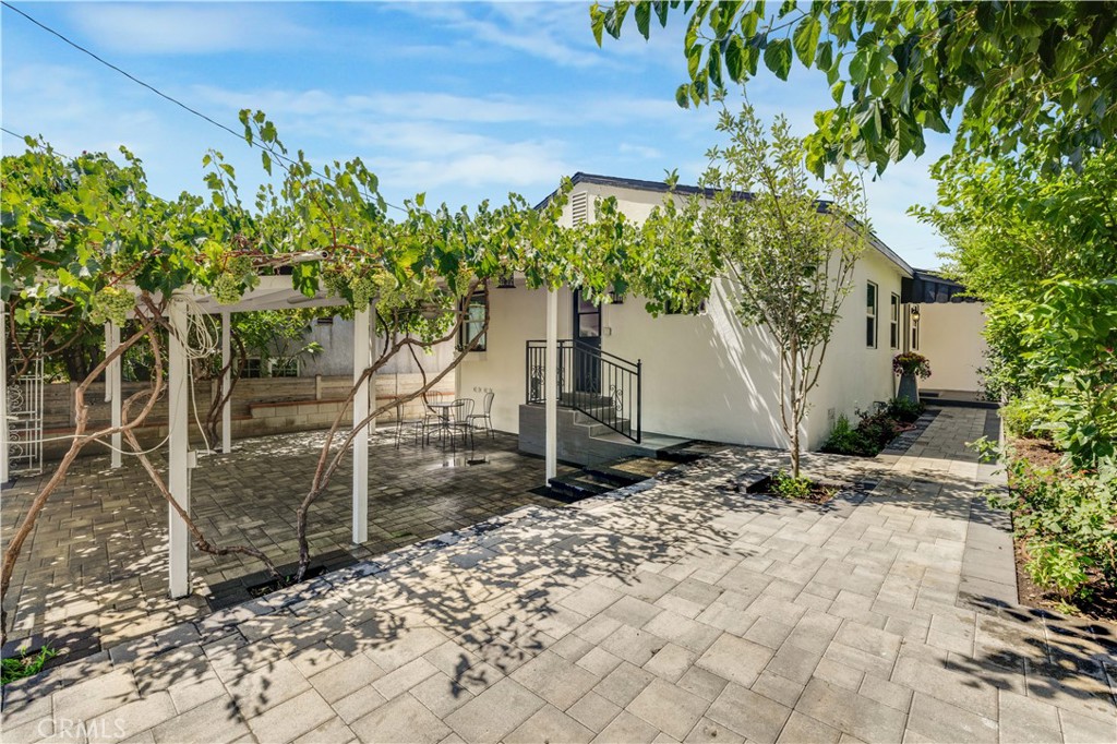 Tucked away on a quiet cul-de-sac, this beautifully updated home has comfort, charm, and modern upgrades throughout. Step into the cozy living room featuring updated laminate floors, newly painted walls, natural light. Recent upgrades include a solar system, recess lighting, updated kitchen and more. The front and backyard have been recently renovated with beautiful pavers. The yard has a charming Tucson feel to it with a mediterranean feel including fruit trees and beautiful grape vines that flows in the yard and creates a relaxing vibe. Entertain your friends at the patio and enjoy some BBQ nights with a new BBQ station patio. Come and be the first one to dive into this charming relaxing yard. This home truly combines peaceful living with thoughtful updates and outdoor enjoyment.