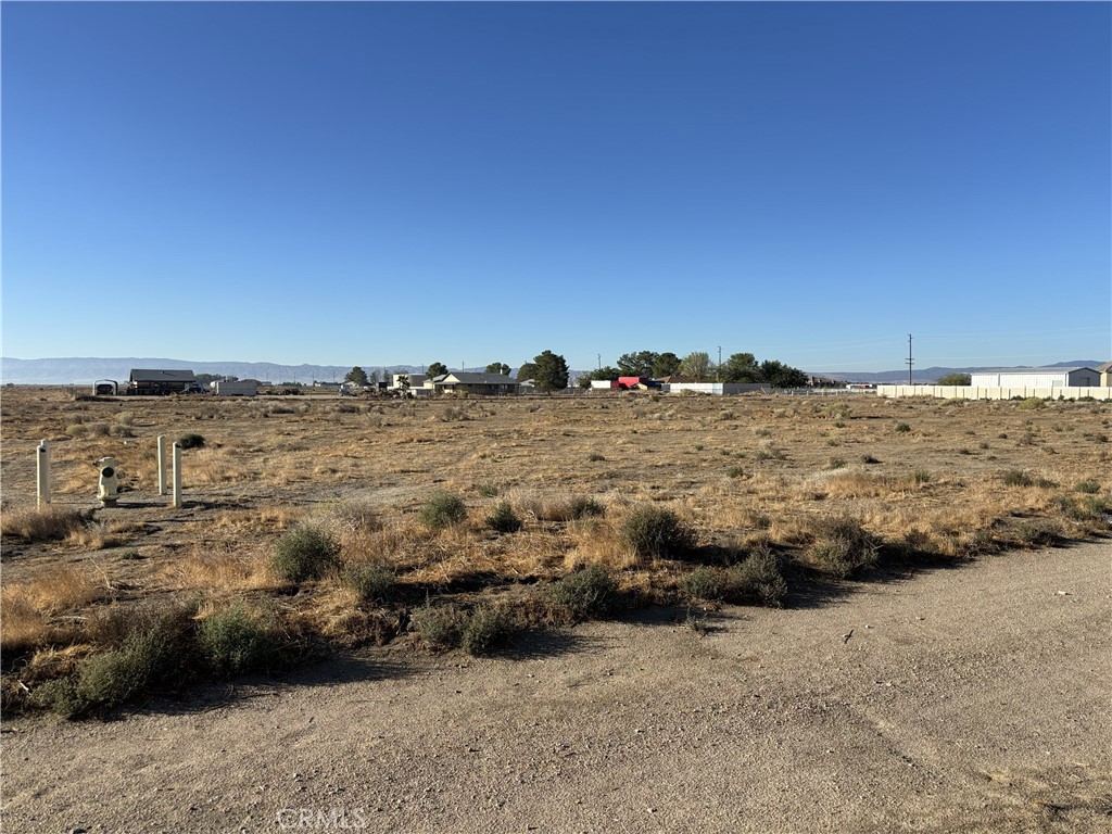 Great Custom Home Site on 2.5 Acre Flat Parcel Located Just off of 70th St West (paved) and W Ave A8 in West Lancaster / Antelope Acres Area. Surrounded by Custom Homes. Located within Sundale Mutual Water District. Power in Street. Road Easements in Place. Build Your Dream Home or Hold as an Investment. The parcel APN# 3260-008-022. Buyer to make their own investigations regarding zoning, general plan designations, utilities, boundaries, etc.