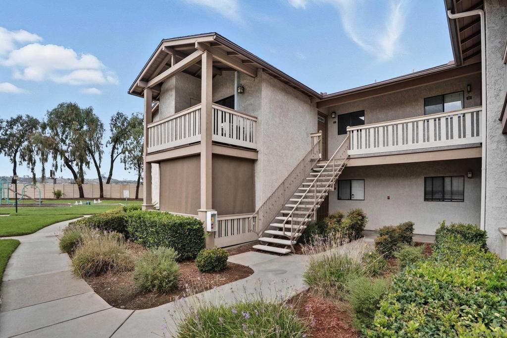 Don’t miss this opportunity to take over a beautiful top floor condo with a VA assumable loan under 4% in a quiet gated community. Offering 2 bedrooms, 1 bath, and just under 800 sq ft of bright and inviting living space, this home blends comfort and style with modern finishes from a recent renovation, in unit laundry, and a fully permitted AC system, one of only a few homes here with full air conditioning. Step onto your private balcony overlooking a peaceful green courtyard and enjoy the sense of calm throughout. The community offers resort style amenities including a pool, spa, fitness center, BBQ area, and two assigned parking spaces. Conveniently located just minutes from Target, Costco, and easy access to I-8 and 67. Call today to schedule your private tour, this one will not last.