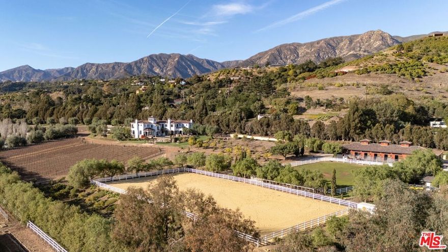 Spread over 10 acres, this romantic, Mediterranean Summerland retreat is just moments from Montecito, Padaro Lane Beach, and the Santa Barbara Polo Club. Home to perfectly framed ocean, island, and mountain views, this private estate features an approx. 8,725-square-foot villa with 4 ensuite bedrooms all on one level. Thoughtfully designed for both formal and casual living, the villa includes a moody library, a screening room, a wine cellar, covered loggias, and an infinity pool with spa. The estate also boasts state-of-the-art equestrian facilities, a charming guest apartment, and hobby vineyardsoffering the ultimate blend of luxury, lifestyle and endless possibilities.