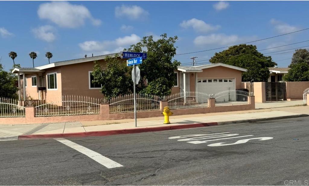 Welcome to 1411 Green Bay Street, a classic single-story gem nestled in the established Pacific Valley Estates neighborhood of South San Diego. This 3-bedroom, 2-bathroom home on a corner lot offers 1,372 sq ft of living space on a generous 7,000 sq ft lot, very spacious front yard which is fenced and gated with 3 avocados trees. This residence features a traditional layout with spacious living areas and a large backyard cemented throughout with plenty of room to park an RV or boat or additional cars. Enjoy the charm of a well-established neighborhood with no HOA or Mello-Roos. Located just minutes from the I-5 freeway, Imperial Beach, schools, and local parks, this property is perfect for both first-time buyers and investors seeking opportunity in one of San Diego’s most accessible communities.