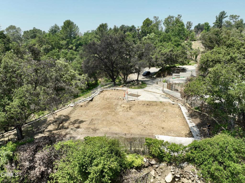 An exceptional Altadena opportunity, situated on a private Street one of Altadena's most highly desirable neighborhoods. This sprawling 31,757 square foot parcel invites you to create your dream home, surrounded by mature trees and offering stunning views of the San Gabriel Mountains , city lights and beautiful Sunsets. Positioned at the end of a serene cul-de-sac with only two other lots, it previously was the site of a 2,812 square foot residence. This prime Altadena location combines a sense of seclusion with endless potential, providing a unique chance to embrace tranquility and natural beauty. Don't miss this opportunity!Both phases I and II of the property cleanup and debris removal are now complete. Buyers should independently verify all zoning, permitting and rebuilding requirements with Los Angeles County and verify status of utilities with local providers. Buyers are responsible for conducting their own investigations to satisfy themselves regarding future development, ability to add units, required lot size, environmental toxicity, community and neighborhood designation, zoning and taxes. Call for more information.