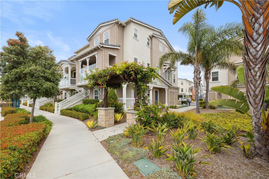 Highly upgraded, bright and spacious corner townhome, located in the well maintained Westerlies community, with immaculate 4 bedrooms (plus den/office), 3.5 bathrooms. Walking distance to Seabridge Marina, restaurants, shopping, Channel Islands harbor, and less than a mile to the beach! Featuring over 2,200sf of living space, this light and bright home offers countless upgrades including luxury vinyl flooring, and high-end finishings throughout. It's unique west facing corner location (only one like it in the complex), welcomes an abundance of natural light through multiple windows, and unobstructed views out towards the coast and marina. Offering an ideal floorplan, 1 bedroom and 1 full bathroom are conveniently located on the first floor. The second floor features the living & dining room, butler's pantry, large den, powder room and upgraded kitchen, quartz countertops, glass tile backsplash, custom cabinetry, and large walk-in pantry. From the living room, head out to the balcony to enjoy ocean breezes, fabulous sunsets, barbecues, and all while taking in the views. Three additional bedrooms located upstairs, including the impressive primary suite also featuring gorgeous views, huge walk-in closet, and spa-like bath with dual sink vanity, soaking tub, water closet, and walk-in shower. Separate laundry room conveniently located on top floor with plenty of storage cabinets. Additional upgrades include 2 zone HVAC, plantation shutters, recessed lighting, and oversized finished two-car garage with ample storage and epoxy floors.