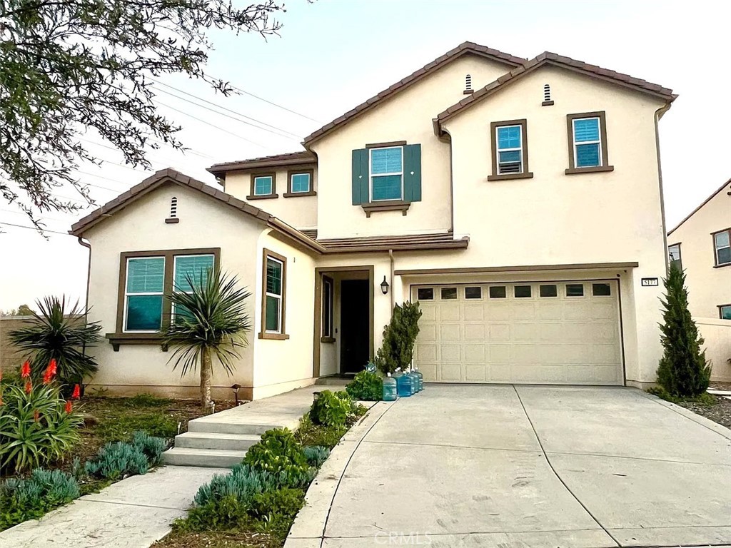 Built in late 2018, this beautiful single-family home in Chino Hills has 4-bedrooms, 3.5-baths and is situated on a large corner lot! The open layout features high ceilings, stainless steel appliances, and an oversized marble kitchen island, perfect for entertaining. The spacious primary suite includes spacious walk-in closets, a double-sink vanity, a soaking tub, and a separate shower. Convenient first floor bedroom and bathroom is perfect for guests or separate office space. The backyard is a true highlight with a private putting green, ample room for a basketball court, and gorgeous views of the Chino Hills landscape. Ideally located near the 71, 60, 91, and 15 freeways, this home has nearby access to top-rated schools like Chino Hills High School, golf courses, Chino Hills State Park, and multiple shopping and dining plazas that are a few minutes away. This is a rare opportunity to own a beautifully-designed corner lot home that's the largest on the street in a highly desirable location!