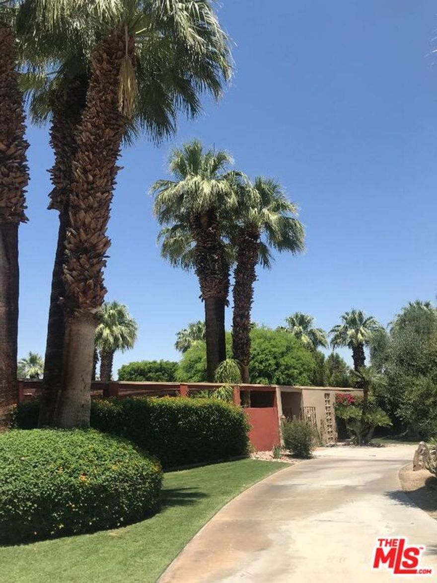 Magnificent 5 bedroom, 5 bathroom desert tennis estate located minutes away from designer shops, restaurants and entertainment on world renowned El Paseo. This unique property is lushly landscaped with over 50 Palm trees, nicely manicured garden offers a pool, jacuzzi, tennis, putting green, and lots of outdoor activities on spacious grounds.