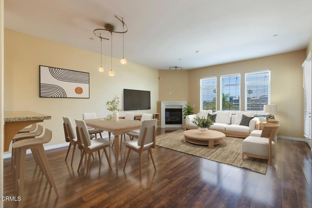 Welcome to this stunning top-floor condo in the heart of Marina del Rey, where coastal living meets modern comfort. This 1 bed, 1.5 bath home features an open layout, hardwood floors, and oversized windows that flood the space with natural light and ocean breezes.The chef's kitchen is equipped with sleek Viking stainless steel appliances, ample cabinetry, and a plenty of counter space perfect for cooking and entertaining. The bright and inviting living room centers around a cozy fireplace and opens to a private balcony, ideal for morning coffee or evening relaxation.The generous primary suite includes two closets and a spa-like bathroom with a soaking tub, glass-enclosed shower, and dual vanities. Additional highlights include an in-unit washer and dryer, a stylish powder room for guests, and plentiful storage throughout.Located in a well-maintained building with elevator access and secure 2 reserved parking spots, you're just moments from the Marina, Abbot Kinney, beaches, and everything the Westside has to offer.