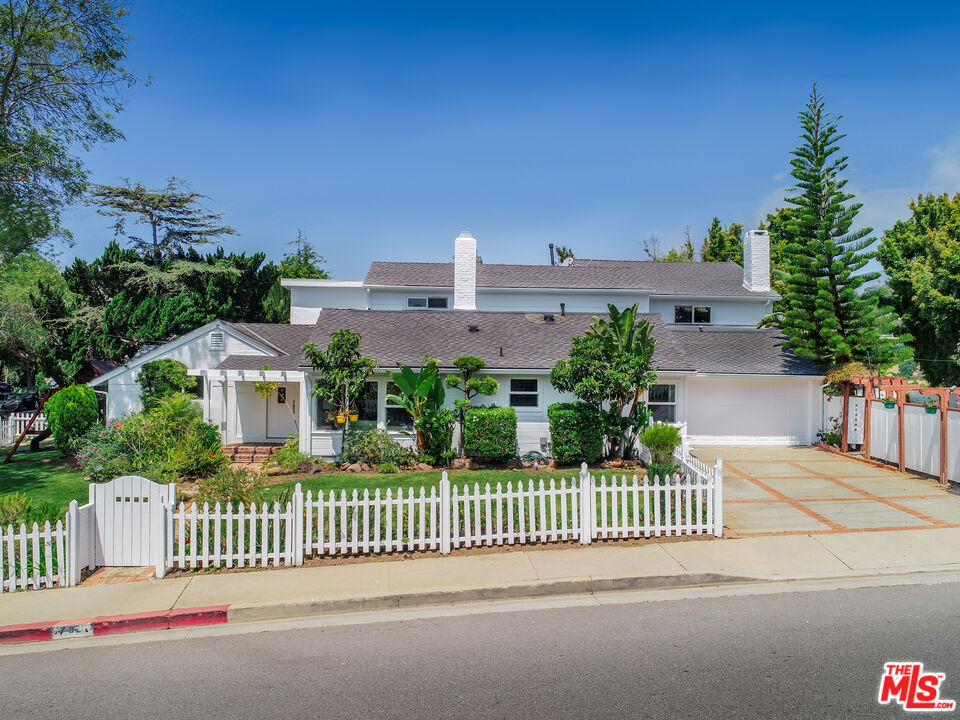 Available August 2025 - Located in the coveted and family-friendly neighborhood of Marquez Knolls, this renovated and recently expanded home (2015) nestled on a large flat peaceful corner lot (hard to come across), is the ideal spot to call home! Take in the views of the most peaceful field from the backyard (which is perfect for entertaining!) as well as the master suite which has vaulted ceilings, private balcony, wood burning fireplace, and steam shower. Featured on the second floor is the master suite as well as one additional en-suite bedroom with the remaining 3 bedrooms on the first floor along with an updated kitchen, dining room, living room, and large den. Less than a block from Marquez Charter Elementary, and close in proximity to beautiful beaches (under 1 mile), parks, shopping and award-winning schools this home offers the best of Palisades living. Come see for yourself all that it has to offer!