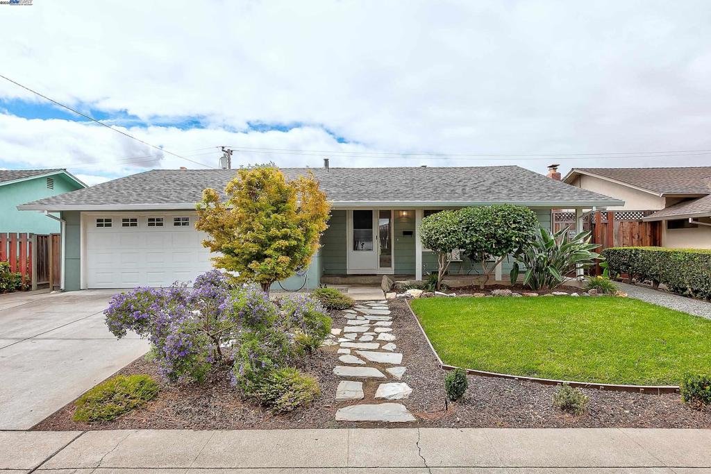 Welcome to this charming ranch-style home located in one of Fremont’s most sought-after neighborhoods. Filled with natural light, this home blends timeless character with modern updates. The inviting front yard has been refreshed, creating the perfect spot to relax on the porch. Inside, original hardwood floors run through the living and dining areas as well as the bedrooms, while the remodeled kitchen shines with newer cabinets, quartz countertops, a stainless steel stove and dishwasher, and luxury vinyl flooring that flows seamlessly into the family room. A cozy fireplace adds warmth and charm, perfect for cool winter nights. Both bathrooms were remodeled in 2024 along with the kitchen, and a new roof was also installed the same year, offering peace of mind. The spacious backyard provides the ideal setting for entertaining family and friends. Conveniently located near shopping, restaurants, parks, top-rated schools, and with easy freeway access, this home is move-in ready and not to be missed